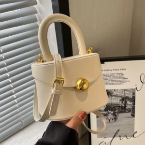Designer Solid Color PU Crossbody Bag 2024 New Ladies Unique Magnetic Buckle Flip Bucket Bags Simple Elegant Party Handbag Trend - Image 1