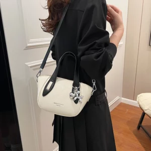 High end and niche solid color bag for women in 2024, new summer fashion crossbody bag, popular this year, portable bucket bag - Image 2